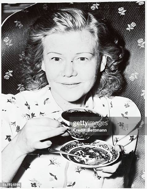 Mrs. Lela Rogers, mother of Ginger Rogers, the movie star, calmly had a cup of tea, and said: "It's up to him," when asked whether she and J. Edgar...