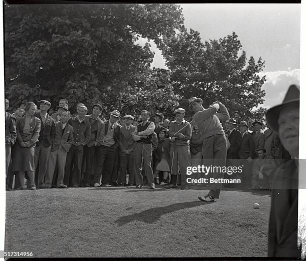 Sam Snead, one of the nation's leading golfers, driving off from the 13th tee in the opening round of the Metropolitan Open Golf Tournament.