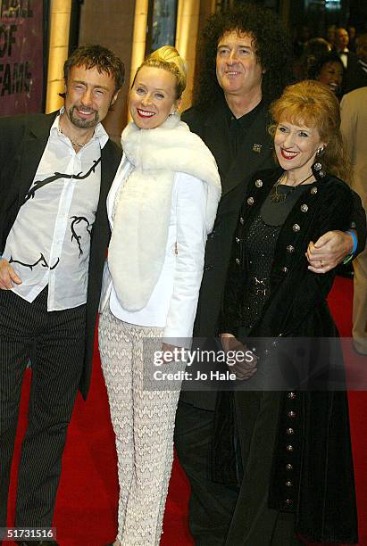 Musician Paul Rodgers, wife Cynthia, guitarist Brian May and actress Anita Dobson arrive at the final of "UK Music Hall Of Fame", the Channel 4...