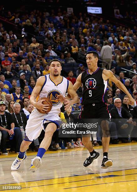 Klay Thompson of the Golden State Warriors drives on Pablo Prigioni of the Los Angeles Clippers at ORACLE Arena on March 23, 2016 in Oakland,...