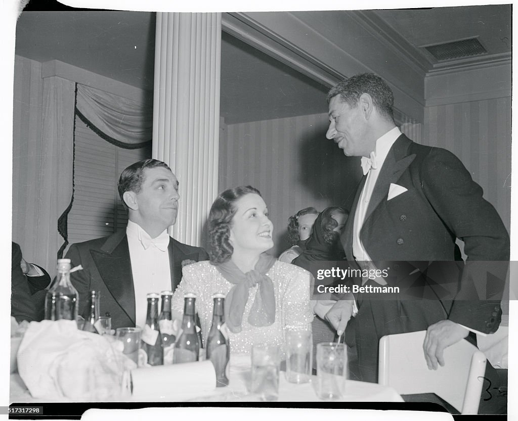 Robert Cobb and his wife, actress Gail Patrick are greeted by their