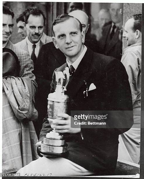 Richard Burton of Britain is shown with his trophy after he recently won the British Open Golf Championship at St. Andrews. Burton beat Johnny Bulla...