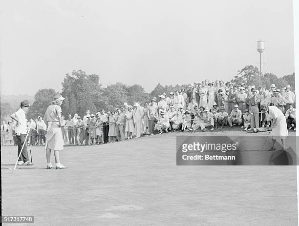 Mrs. Glenna Collett Vare, veteran golf champion of Philadelphia, putting on the 18th green of the Wee Burn course as she lost, 2 up, to Miss Marion...