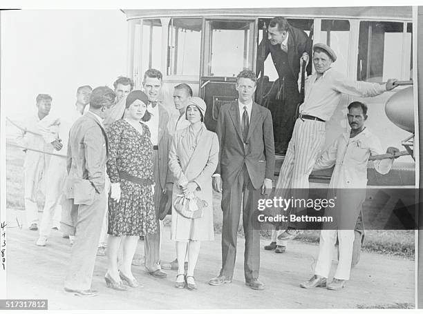 Colonel and Mrs. Charles A. Lindbergh at the Metropolitan Airport here just before they made a thirty minute flight in the Goodyear Dirigible...