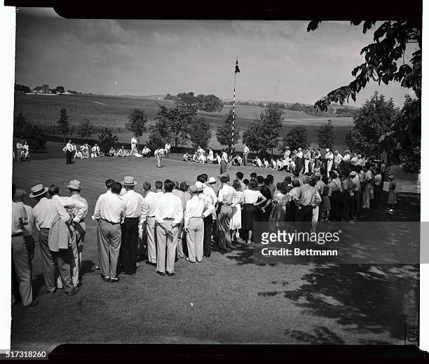 Byron Nelson putting on the fourth green at the Hershey, Pennsylvania, country club, as he defeated Ralph Guldahl, one up in 36 holes, to gain the...