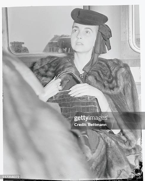 Countess "Babs" Back. New York, New York: Countess Barbara Hutton Haugwitz-Reventlow, answering questions of reporters aboard the SS Conte di Savoia...