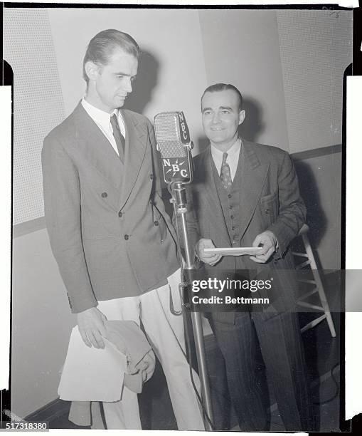 Howard Hughes, millionaire sportsman flyer, left, with special events announcer Clinton Twiss at the Hollywood Studios of NBC where the flyer was...