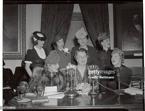 Mrs. Franklin D. Roosevelt is shown with some of the women that met at the White House, on January 6th, to participate in a radio appeal to aid the...