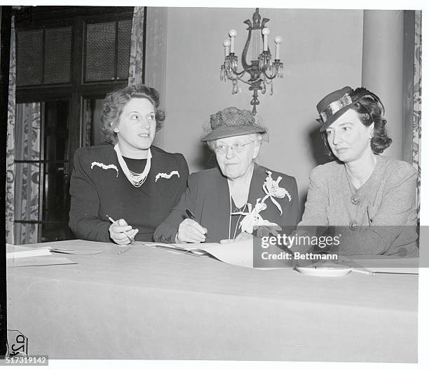 Sign Stating Purpose of Woman's Centennial Congress. New York: Delegates to the Woman's Centennial Congress sign the Declaration of Purpose of the...