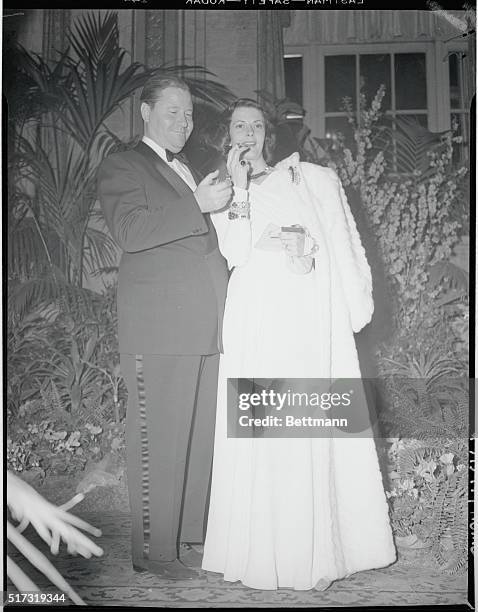 The film actor Jack Oakie and his wife are shown at the Biltmore Hotel in Los Angeles, California, where they are attending the 13th Annual Academy...