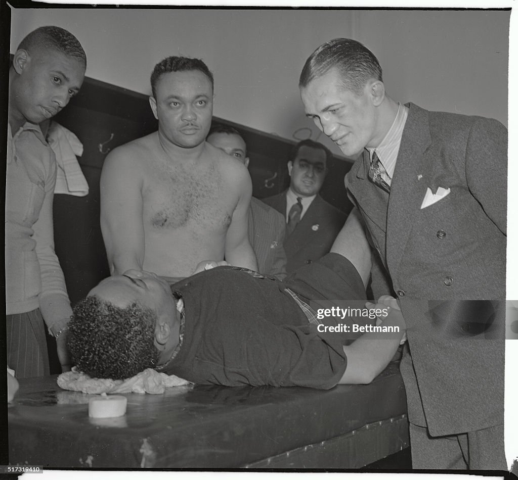 Henry Armstrong Laying Down Shaking Fritzie Zivic's Hand