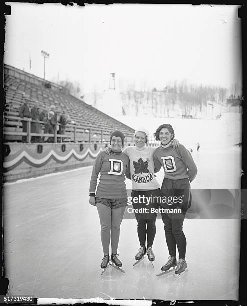 Winners of Exhibition Races are shown left to right: Elizabeth DuBois, was the winner of the 1,000 meter race; Miss Jean Wilson of Canada, captured...
