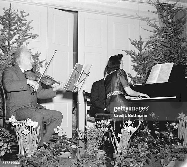 Making one of his rare appearances as a musician, Albert Einstein gave a violin recital, January 24th, at the Present Day Club, for the benefit of...