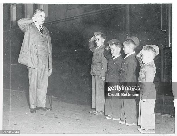 Children and Canadian Prime Minister Saluting