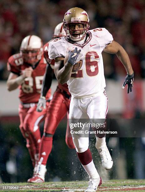 Willie Reid of the Florida State Seminoles runs against the North Carolina State Wolfpack during an ACC game on November 11 at Carter-Finley Stadium...