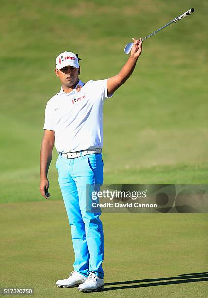 Anirban Lahiri of India watches his eagle putt drop on the 16th green during the second round of the World Golf Championships-Dell Match Play at the...