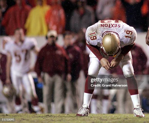 Quarterback Wyatt Sexton of the Florida State Seminoles reacts after being called for a delay of game penalty against the North Carolina State...