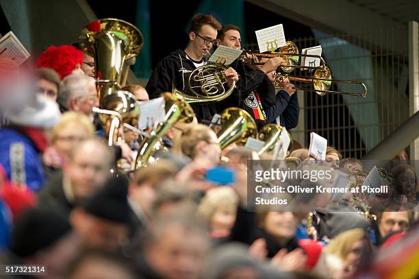 Musicians supporting the German National Team with fan songs at Frankfurter Volksbank-Stadion during the international football match between Germany...