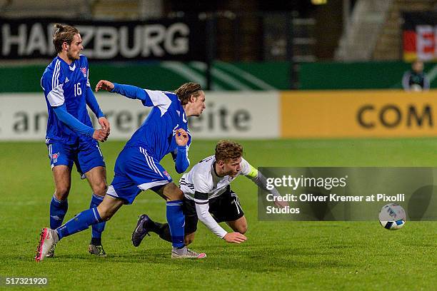 Midfielder Max Meyer of Germany is fouled by Andrias H. Eriksen of Faroe Islands at Frankfurter Volksbank-Stadion during the international football...