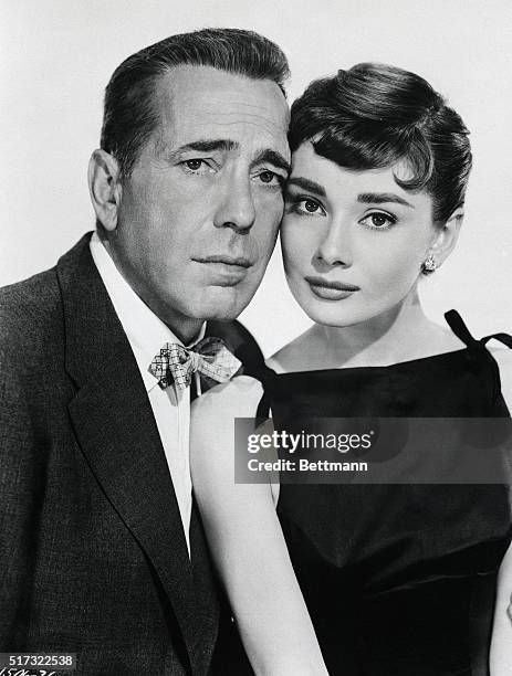 Humphrey Bogart and Audrey Hepburn appear in a publicity still for the film Sabrina, in 1954.