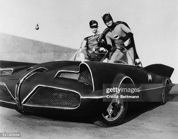 Batman and Robin in the Batmobile Batman and Robin in the Batmobile