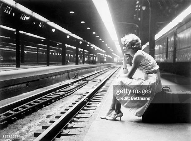 Chicago, Illinois: Waiting in vain at Union Station here 9/1 Ellen Schmitz of St. Louis typifies plight of many travelers in Chicago and other cities...