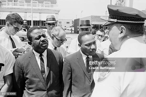 Dr. Martin Luther King, Jr. And Reverend Ralph Abernathy are arrested by Albany Chief of Police Laurie Pritchett during a civil rights protest at...