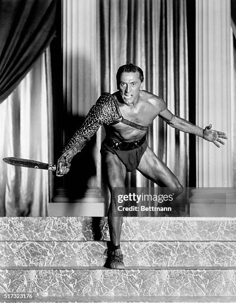 Actor Kirk Douglas wears a gladiator's costume in the title role of Spartacus.