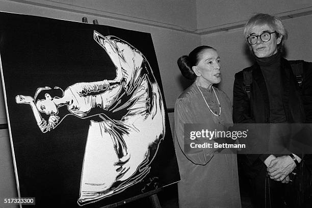 Martha Graham and Andy Warhol attend the unveiling of a screened print Warhol of her dancing at the Martha Graham Dance Center.