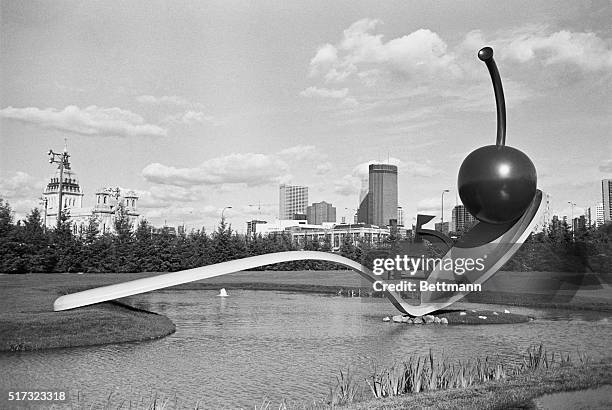 Minneapolis, MN- Sculpture called Spoonbridge and Cheery by Claes Oldenburg and Coosje van Bruggen at the new Minneapolis Sculpture Garden; can see...