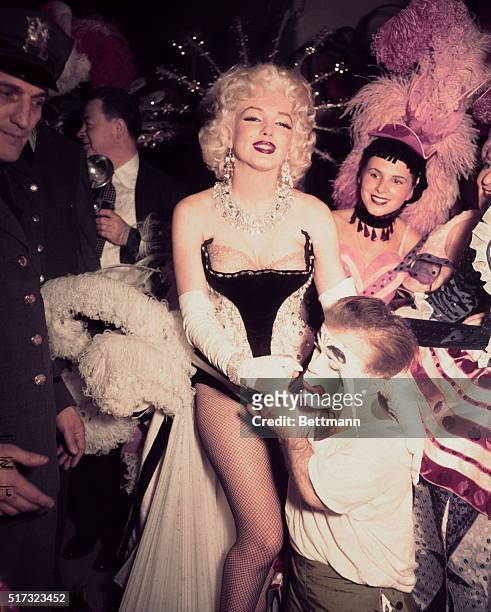 Marilyn Monroe takes part in a circus benefiting the Arthritis and Rheumatism Foundation in Madison Square Garden.