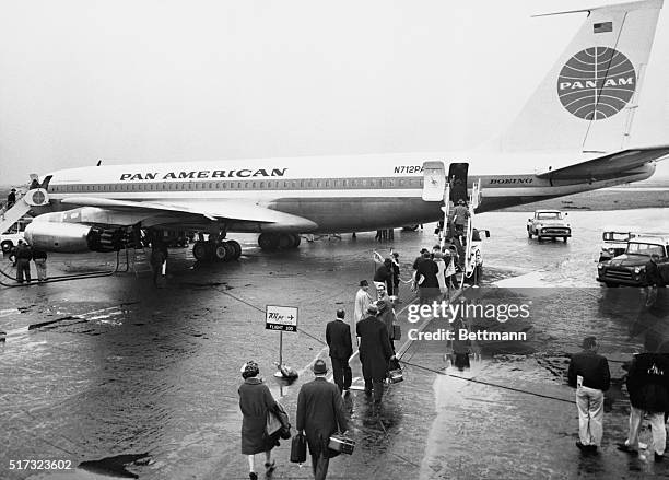 New York, NY: A portion of the 100 passengers on the Pan American World Airways 707 Jet Clipper which inaugurated the airlines Trans Atlantic...