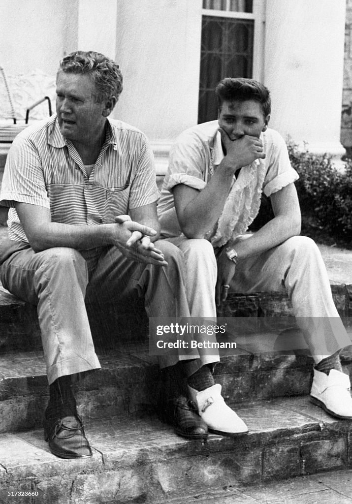 Private Elvis Presley Sits With Father