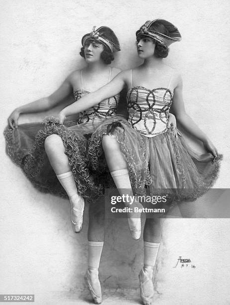New York, NY: The Cameron Sisters, in the Ziegfeld Nine O'Clock review, Miss 1920, atop the New Amsterdam Theatre. Photograph.