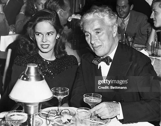 Actor Charlie Chaplin and his new bride 18-year-old Oona make their first public appearance at the nightclub Mocambo.