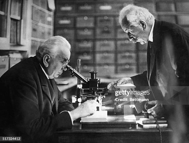 Lyon, France: Auguste Lumiere and Louis Jean Lumiere in their laboratory at Lyon, France. The Lumiere brothers invented the Lumiere process of color...