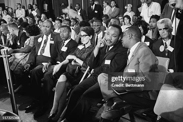 Martin Luther King, Jr., joins other leaders of civil rights movement as they listen to testimony before the credentials committee. Shown are: James...