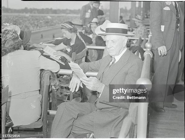 At the Derby. Louisville, Ky.: Col. E. R. Bradley, well known race horse owner, was among the 70,000 who witnessed the 64th running of the Kentucky...