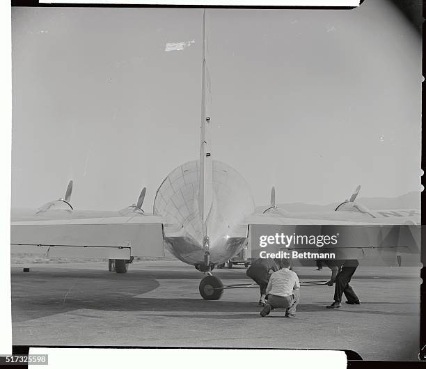 To give an idea of just how far aeronautical designers, can go with the streamlining effect, this above view of Howard Hughes' newest four-motored,...