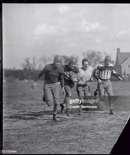 Harold "Red" Grange, with kids at Temple University.