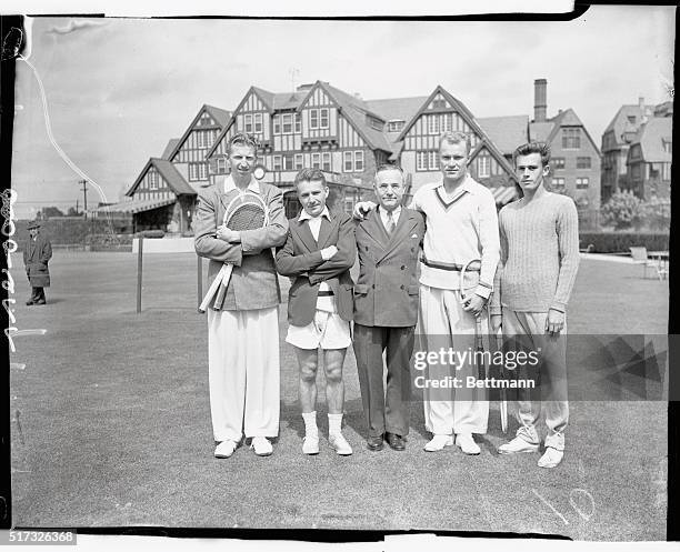 Davis Cuppers are shown posed here. Left to right: Donald Budge, "Bitsy" Grant, Captain Walter L. Payer, Gene Mako and Frankie Parker.