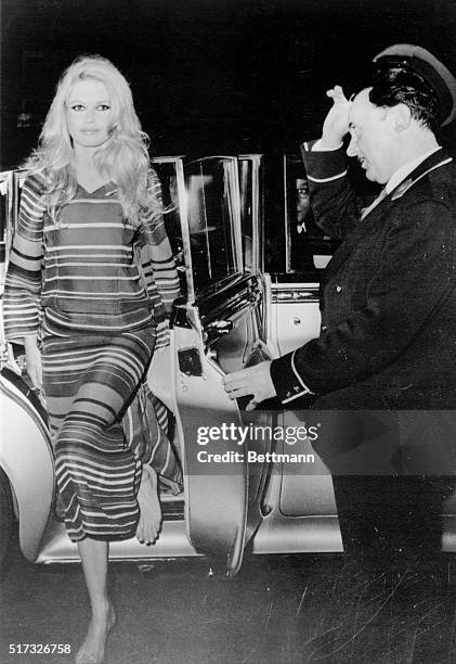 To arrive at fashionable Maxim's in a Rolls Royce and to enter the restaurant barefoot takes savoir-faire and that's a commodity Brigitte Bardot has...
