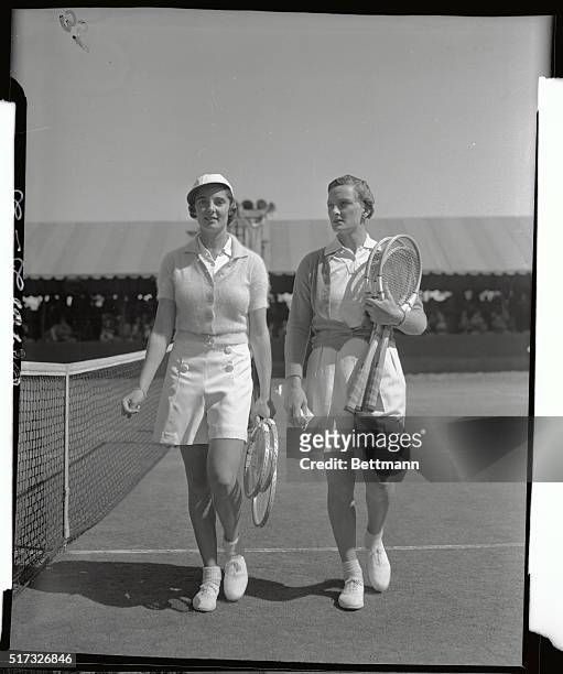 Lovely Kay Stammers, star of the British Tennis contingent, and her quarter finals adversary, ex-champion Helen Jacobs, of Berkeley, California, are...