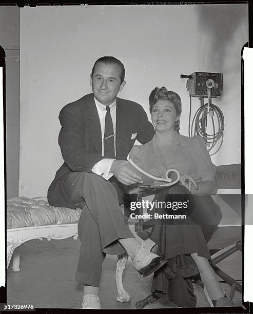 Neal Lang and bride Martha Raye.