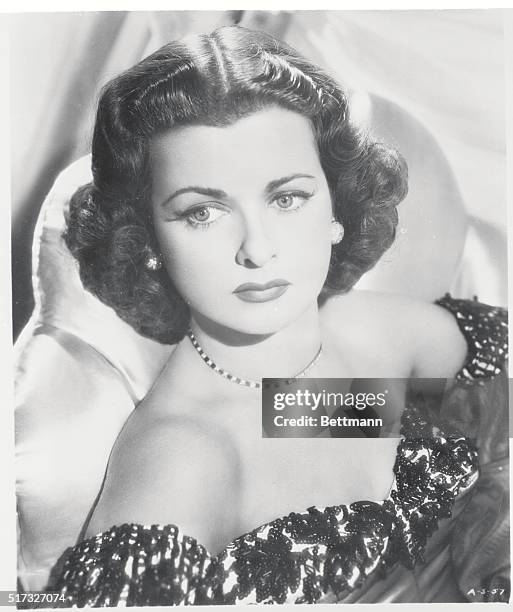 Point of Shooting Triangle. Hollywood, Calif.: These are two character studies of actress Joan Bennett from recent motion picture stills. Miss...