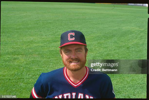 Close up of pitcher Bert Blyleven of the Cleveland Indians. Photo shows Blyleven smiling up at the camera on the field.