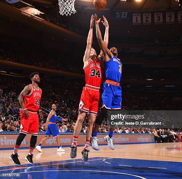 Langston Galloway of the New York Knicks goes up for the ball against Mike Dunleavy of the Chicago Bulls at Madison Square Garden on March 24, 2015...