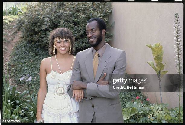 Laguna Hills, California: Olympic hurdler Edwin Moses who holds the world record on the 400-meter hurdles, poses with his new wife Myrella Bordt 6/2,...