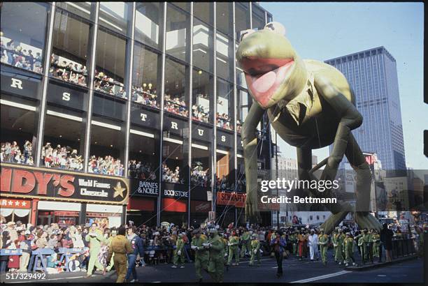 New York, New York: A giant inflatable balloon of Kermit the Frog makes its way down the parade route during the annual Macy's Thanksgiving Day...
