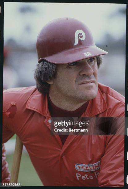 Close-up of the Philadelphia Phillies' infielder Pete Rose, seated on a bench during spring training for the 1983 baseball season.